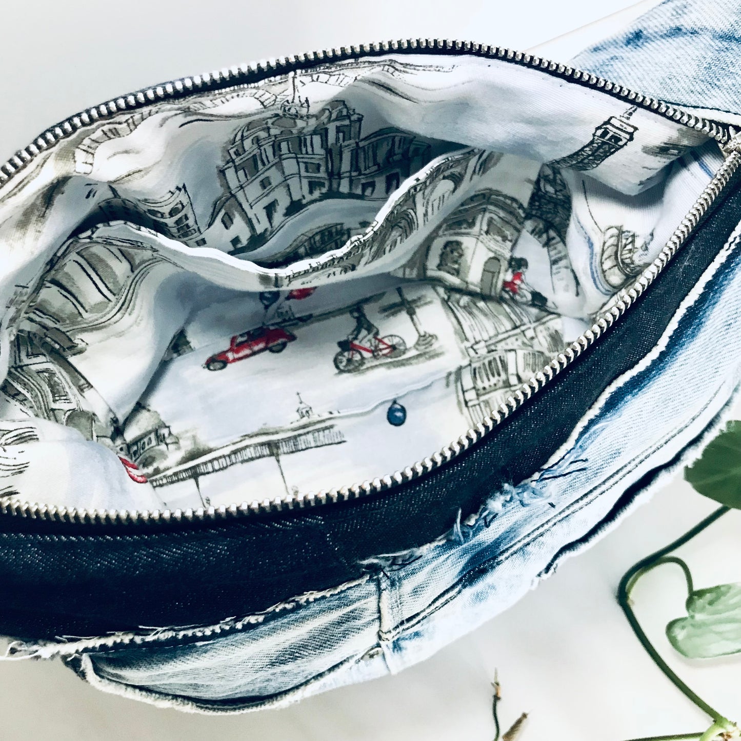 Conscious Carry-all with light blue denim and Paris lining with upcycled tassle