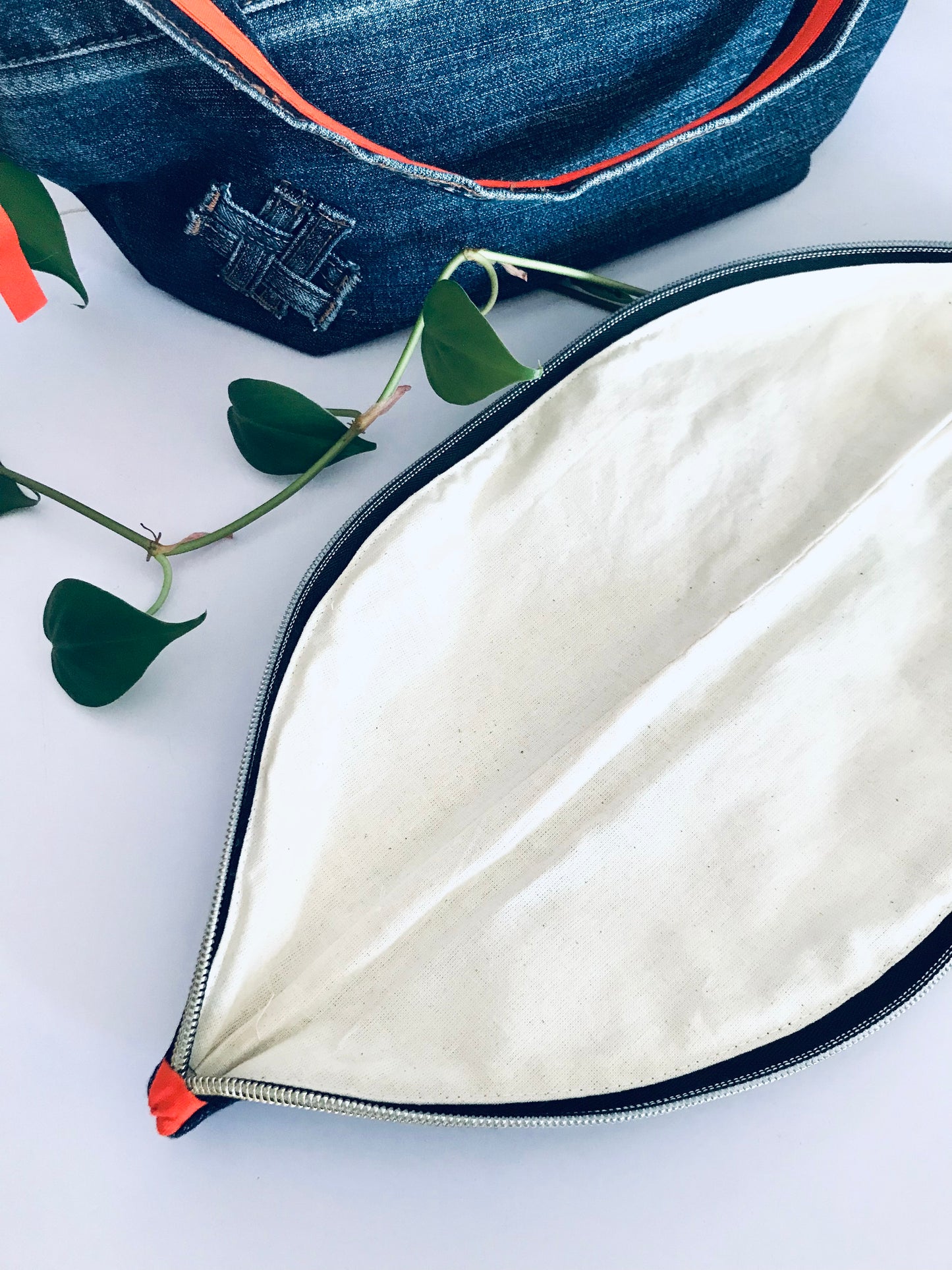 Hobo Zero with classic blue denim, orange trim and matching zipper pouch